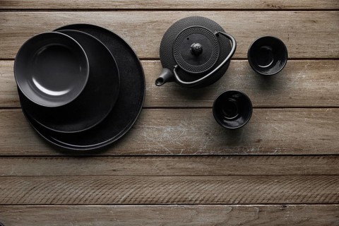 Top view teapot with dishware