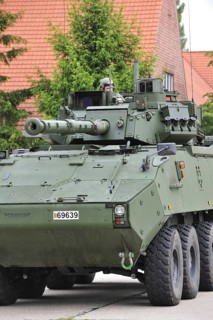 Commander in turret of MOWAG Piranha IIIC armoured fighting vehicle of the Belgian army