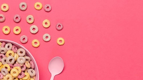 Bowl cereal fruit loops with spoon copy space