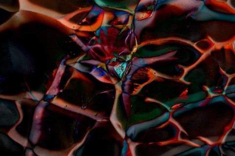 Dark colorful chaotic design pattern background