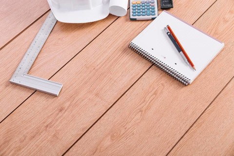 Notebook near measuring tools