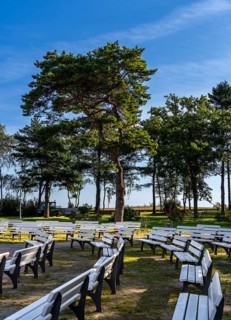 White benches in the park