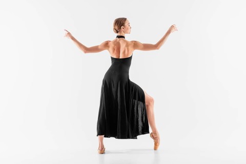 Full shot woman wearing pointe shoes dress