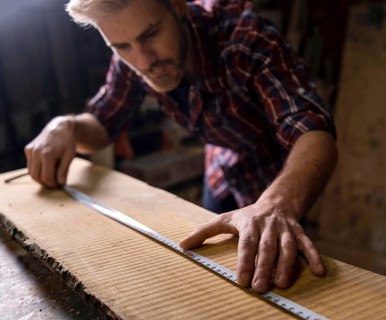 Close up man working with wood 2