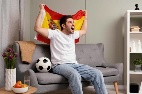 Man watching sport program tv