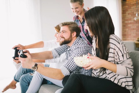 Cheerful people playing game party