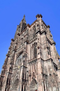 Tower of famous Strasbourg Cathedral in France in romanesque and gothic architecture style