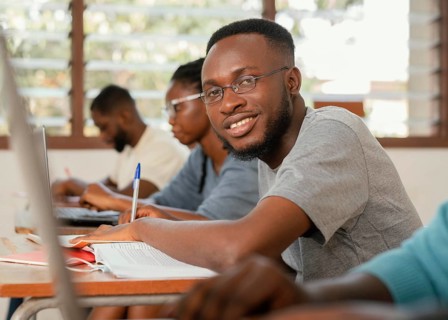 Close up students learning class