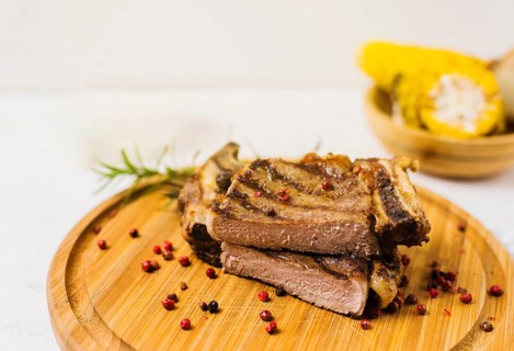 Cut steak wooden board