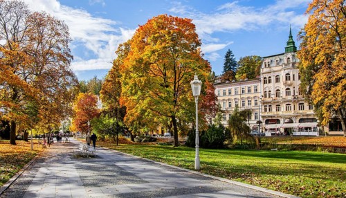 Promenade in autumn spa park
