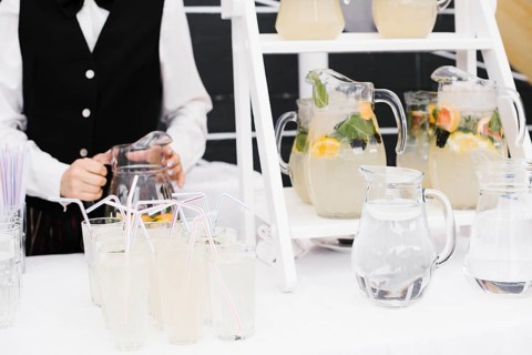 Fresh lemonade with straws table