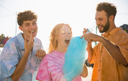 Group friends eating cotton candy
