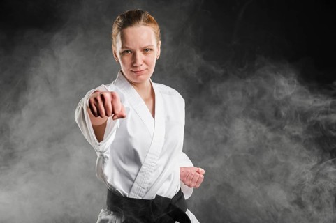 Medium shot woman fighter