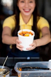 Close up blurry woman with food 2