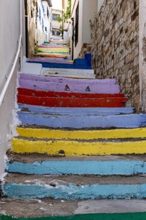 Colourfully painted stairs to Sevda Hill