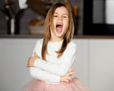 Front view girl tutu skirt with mouth wide open