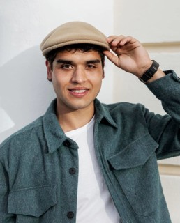 Medium shot man holding hat