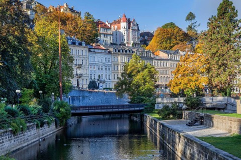 Typical facades on the banks of the Tepla in autumn