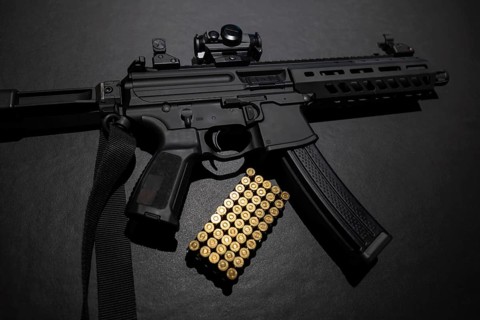 Modern Elegant Assault Rifle and Bullet on Grey Background in Switzerland