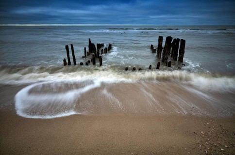 Remains of an old weathered groyne