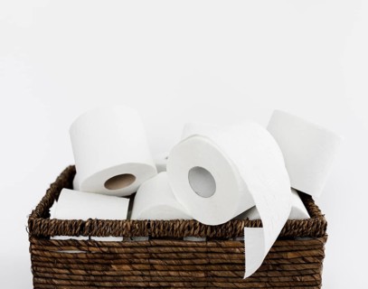 Backet with toilet paper rolls