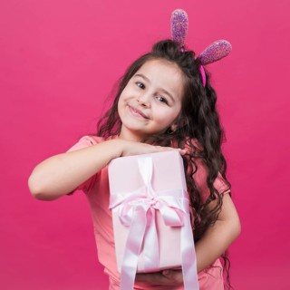 Cute girl bunny ears with gift box