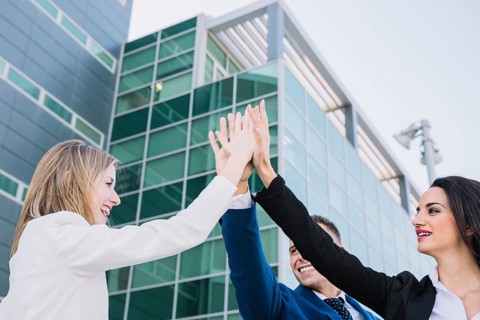 Business team making high five