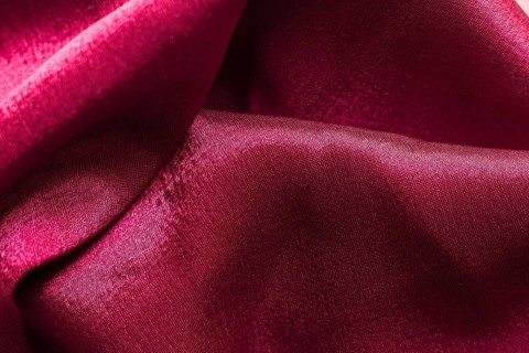 Close up texture burgundy fabric suit