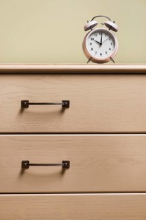 Alarm clock wooden closed drawer