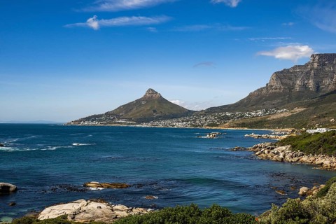 Atlantic Ocean with Lion's head and Table Mountain from Llandudno beachCape Town