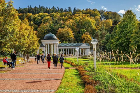 Spa promenade with Rudolph's Spring in the autumnal spa park