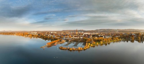 Aerial panorama of the town of Radolfzell on Lake Constance in autumnal vegetation with the Waeschbruckhafen