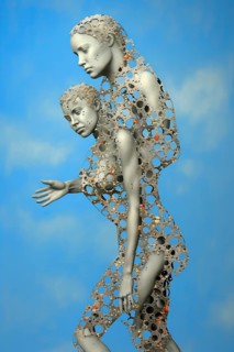 Surrealist white bionic metallic women creatures