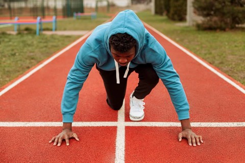 Active teenager jogging outdoors