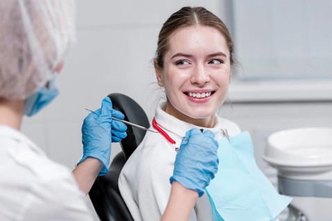 Front view adult female dentist