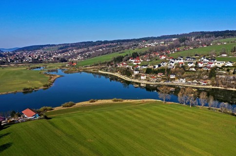 Lake Lac des Brenets in the valley of the border river Doubs