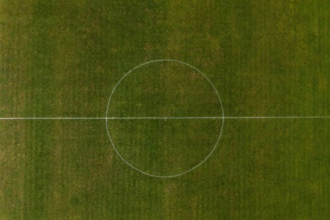 Drone view of the centre circle on a football pitch