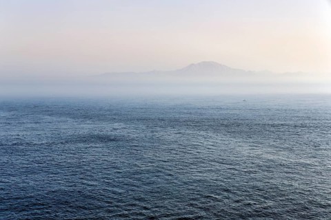 View of the coast of Morocco on the horizon