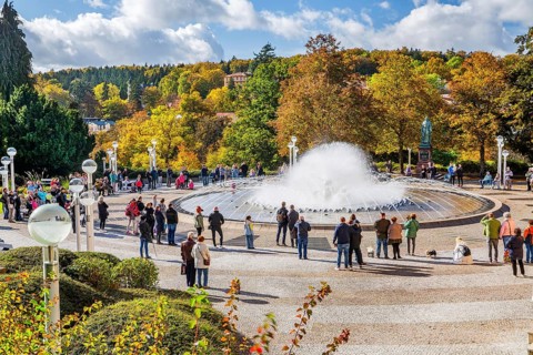 Singing fountain in autumn spa park
