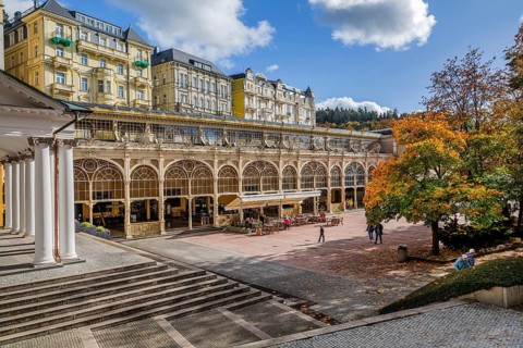 Spa promenade with spa colonnade in the autumnal spa park