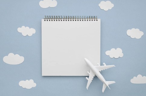 Frame clouds with airplane notebook