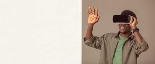 Afro american man using virtual reality headset copy space
