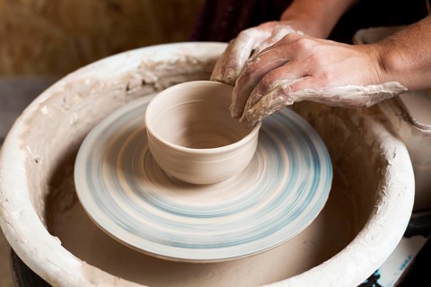 High view modeling clay potter s wheel