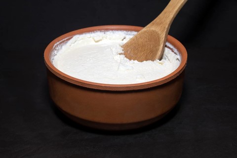 Original Turkish Kaymakli yoghurt matured in a clay bowl
