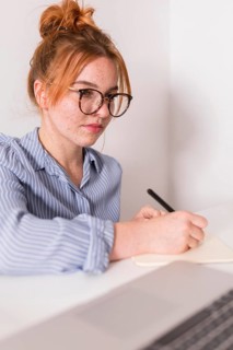 Female teacher paying attention students during online class