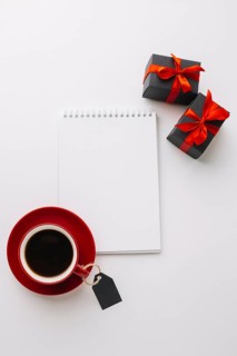 Black friday notebook mock up with coffee