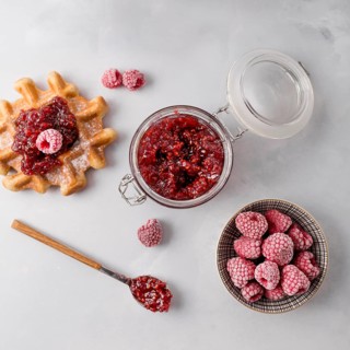 Frozen raspberries jam top view