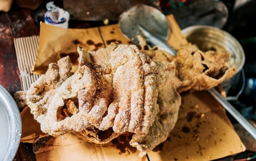 Top view of homemade chicharron on the table. Homemade Nicaraguan pork rinds