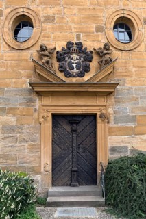 Entrance portal of St Luke's Church with the coat of arms of the von Egloffstein family