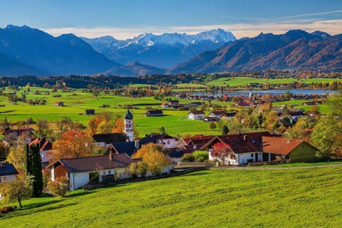 View of the village in autumn with Riegsee